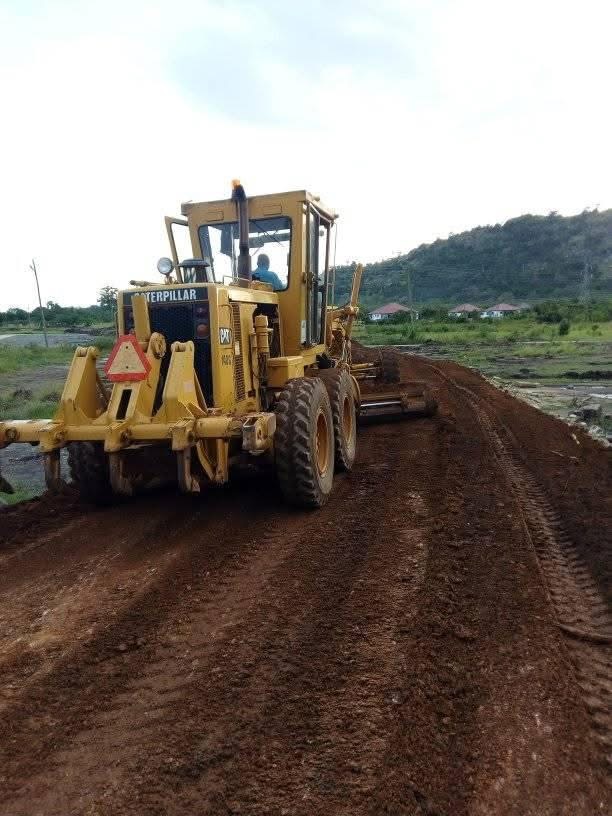 Road leveling with grader